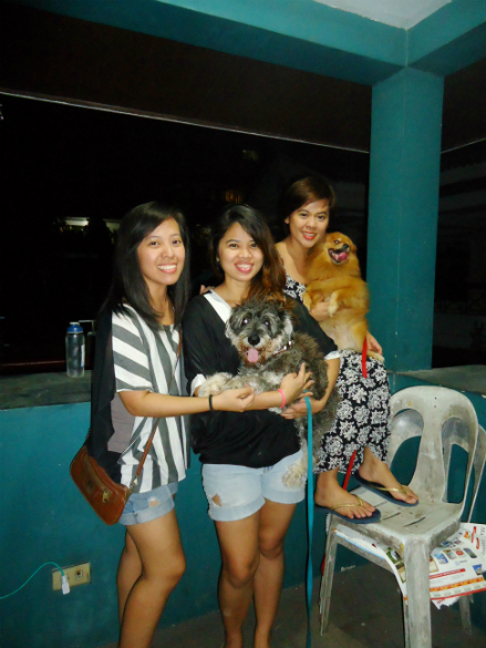 with my sisters and our two dogs